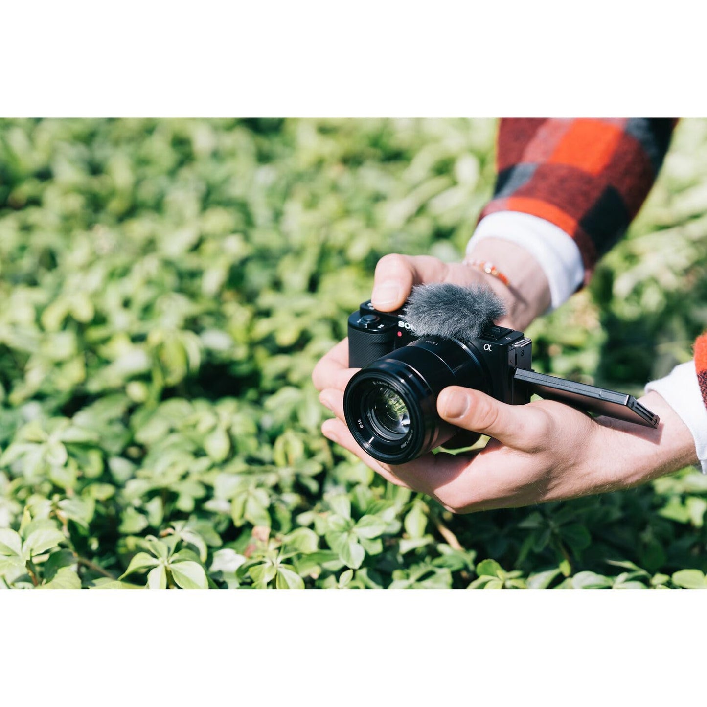 Sony ZV-E10 Mirrorless Camera Kit with 16-50mm II Power Zoom Lens (Black) | APS-C Sensor | Compact Creator Tool + 64GB Card + Bag + Card Reader + HDMI Cable + Flex Tripod + Hand Strap + More