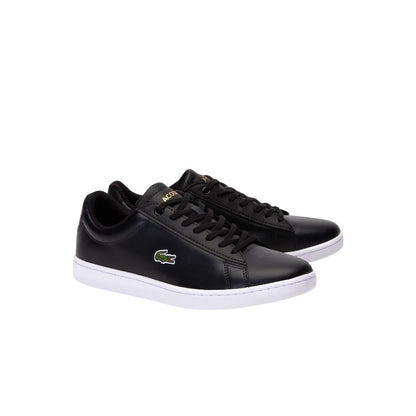 Lacoste Women's Hydez Leather Sneaker, Black/Gold