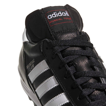 adidas Performance Men's MUNDIAL TEAM Athletic Shoe, black/white/red